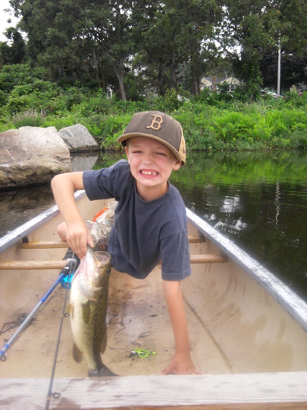 my boy with his first largemouth